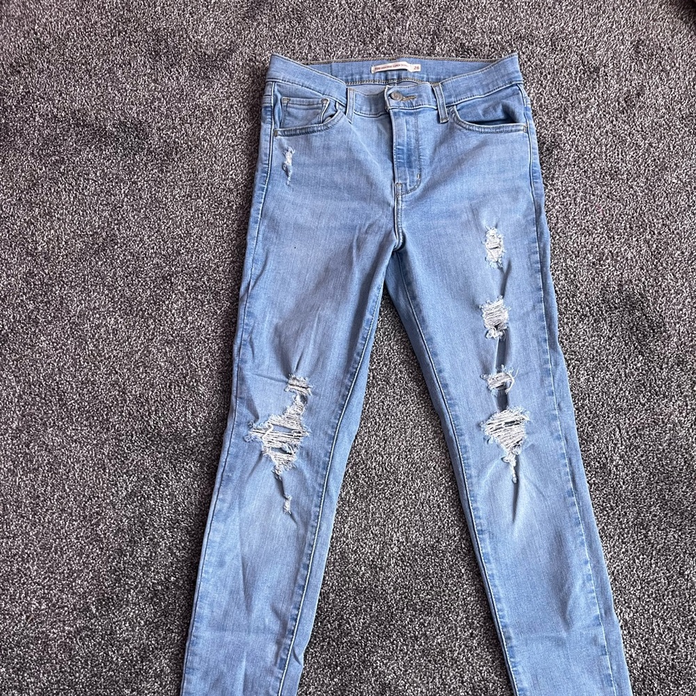 Levi 720 High Rise Super Skinny Light Blue Ripped Jeans